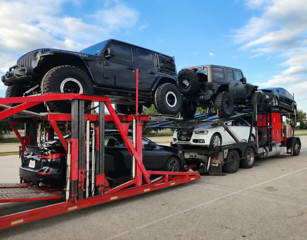 Star Auto Shipping open car carrier truck loaded with vehicles