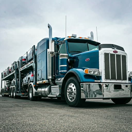 Car carrier truck representing a broker's network of vetted carriers