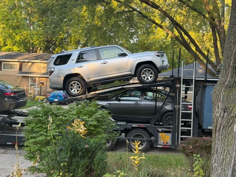 2016 Toyota 4Runner on an open auto transport carrier during shipment from Houston to Beloit