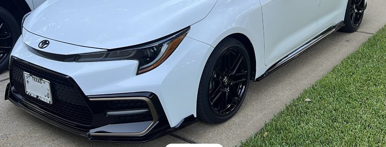 2022 Toyota Corolla with aftermarket side skirts prepared for enclosed transport from Katy, Texas to Gainesville, Florida
