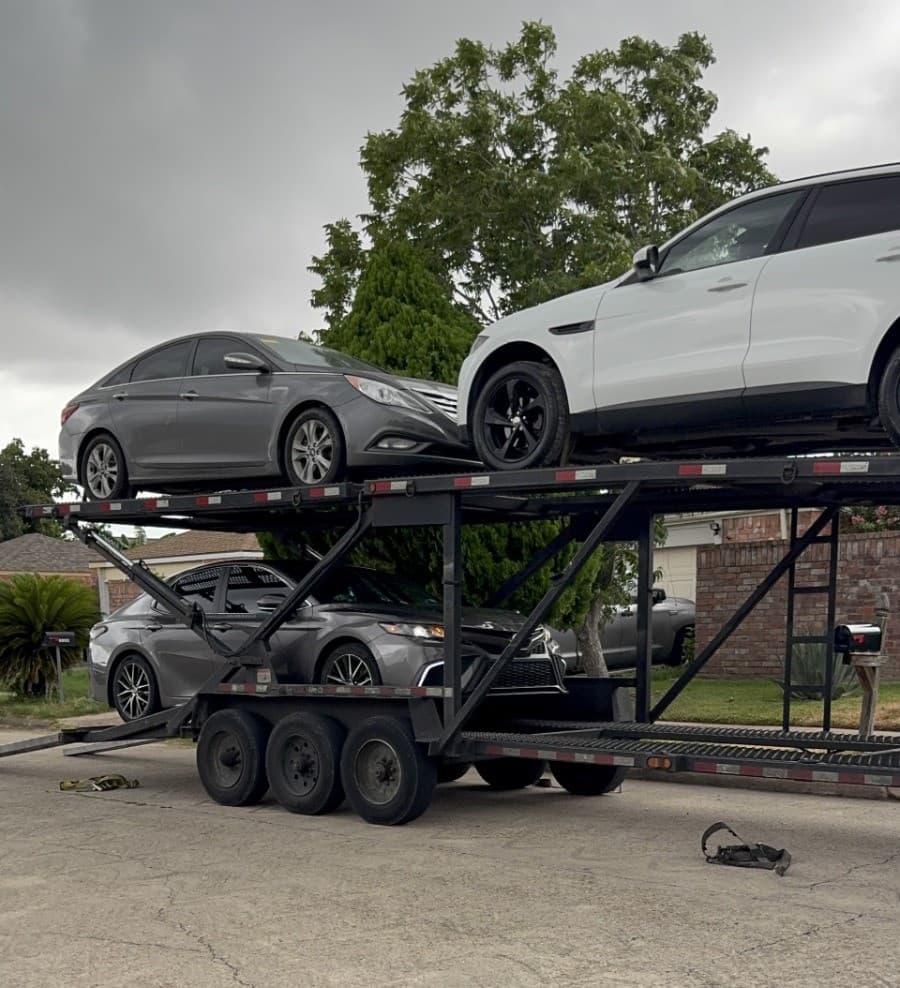 Toyota Camry on an open carrier trailer ahead of transport from Houston, TX to Norcross, GA